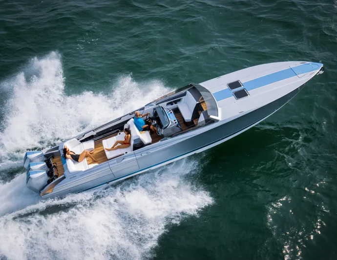  Yacht Photos Pics 2005 Nor-Tech 420 Monte Carlo speedboat cruising on open water, aerial view.