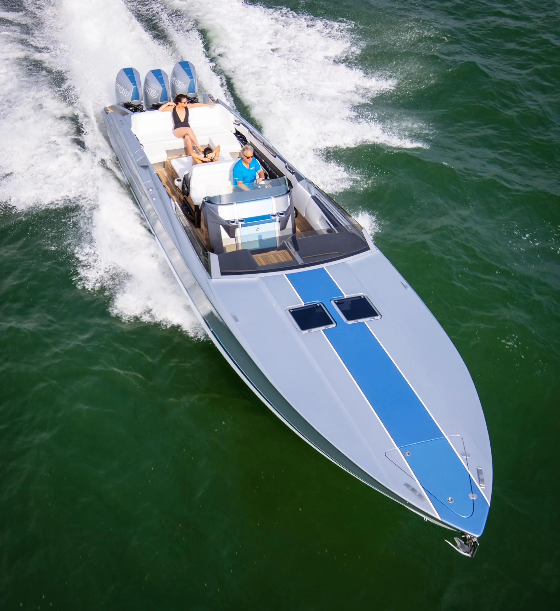 2005 Nor-Tech 420 Monte Carlo speedboat cruising on open water, featuring sleek design and powerful engines.