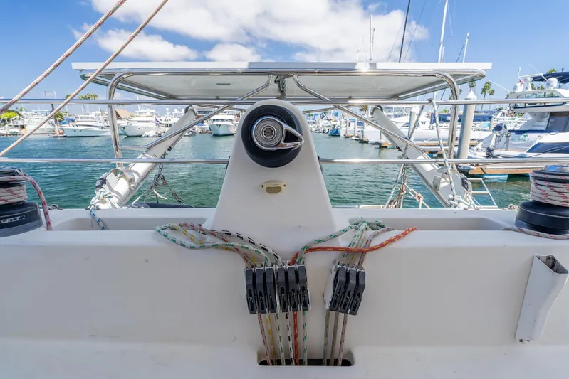Nina May Yacht Photos Pics Catana 431 sailboat helm, 2001 model, docked in marina with clear skies.