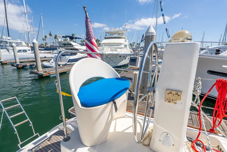 Nina May Yacht Photos Pics Catana 431 sailboat helm with blue seat cushion, docked in marina, 2001 model.