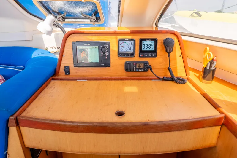 Nina May Yacht Photos Pics Navigation station on 2001 Catana 431 catamaran with instruments and radio.
