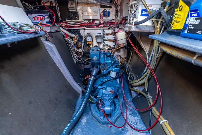 Nina May Yacht Photos Pics Engine room of 2001 Catana 431 sailboat with visible wiring and components.