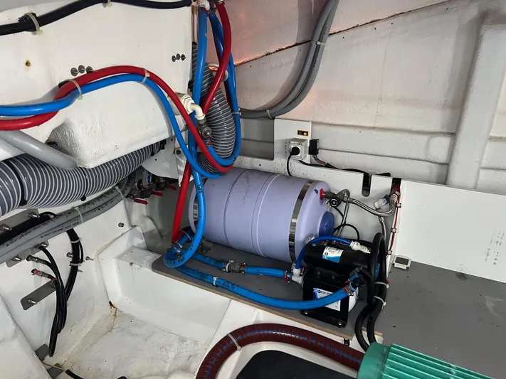 Elixir Yacht Photos Pics Engine room of 2019 Beneteau Gran Turismo 46 with wiring and equipment.