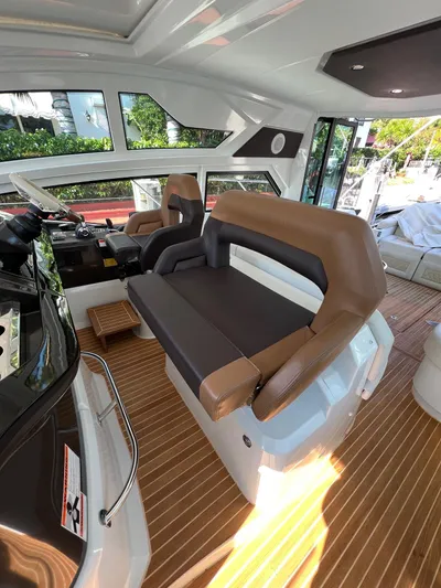 Elixir Yacht Photos Pics Interior of 2019 Beneteau Gran Turismo 46 yacht with modern seating and sleek design.