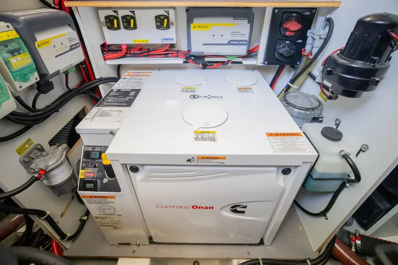Elixir Yacht Photos Pics Engine room of a 2019 Beneteau Gran Turismo 46 with Cummins Onan generator.