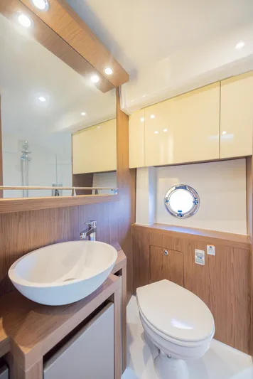 Elixir Yacht Photos Pics Luxurious bathroom in 2019 Beneteau Gran Turismo 46 yacht with modern fixtures.