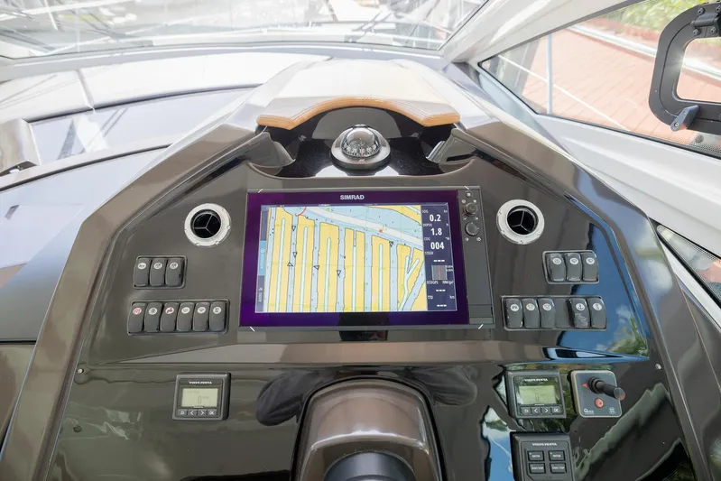 Elixir Yacht Photos Pics Control panel of 2019 Beneteau Gran Turismo 46 yacht with navigation display.