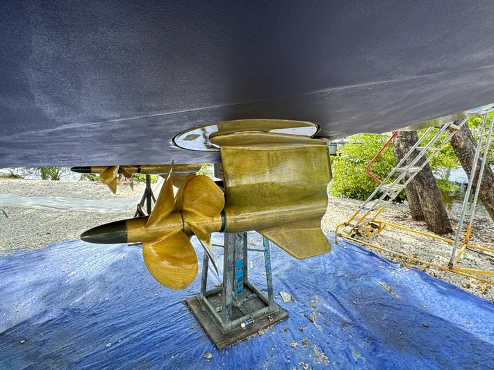 Elixir Yacht Photos Pics Propeller of 2019 Beneteau Gran Turismo 46 yacht on a blue tarp.