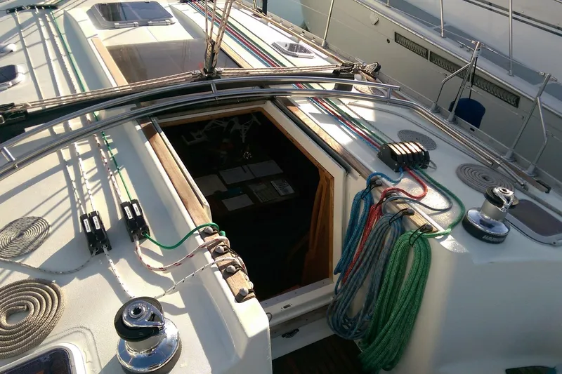 Tangent 2 Yacht Photos Pics Jeanneau Sun Odyssey 45.2 sailboat deck with colorful ropes, 2002 model.