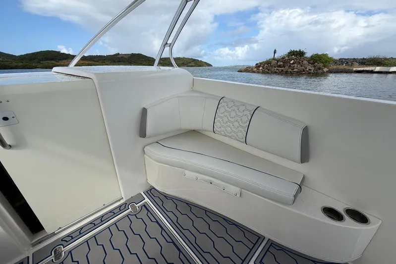  Yacht Photos Pics 2007 Fountain 38 Tournament Edition boat interior with white seating and scenic water view.