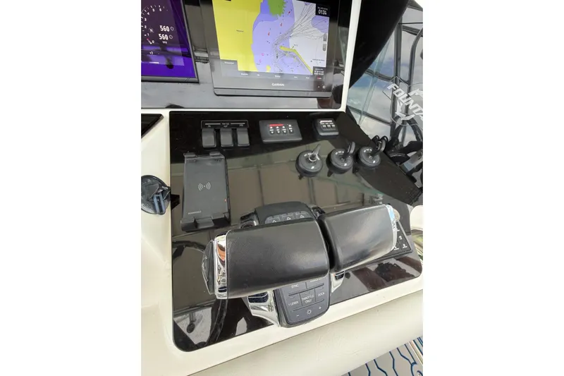  Yacht Photos Pics Control panel of a 2007 Fountain 38 Tournament Edition boat with navigation display.