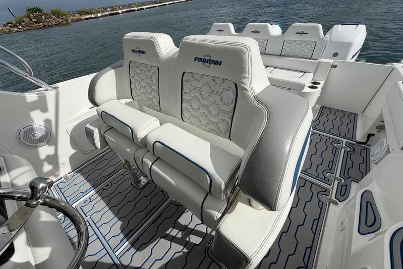  Yacht Photos Pics 2007 Fountain 38 Tournament Edition boat interior with stylish seating and modern design.
