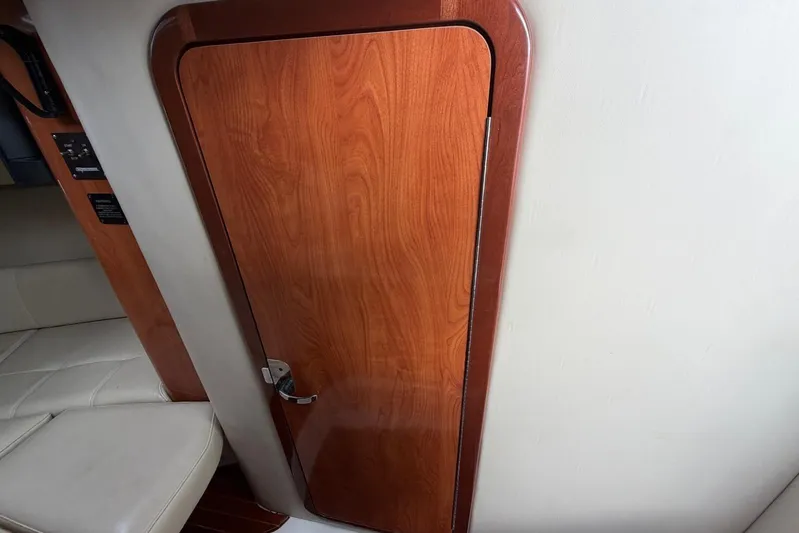  Yacht Photos Pics Wooden cabin door inside 2007 Fountain 38 Tournament Edition boat.