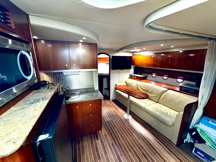  Yacht Photos Pics Luxurious interior of 2008 Cruisers Yachts 390 Sports Coupe with modern amenities and elegant design.