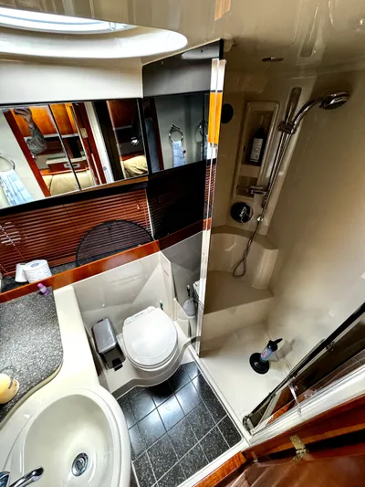  Yacht Photos Pics Luxurious bathroom in 2008 Cruisers Yachts 390 Sports Coupe with shower and modern amenities.