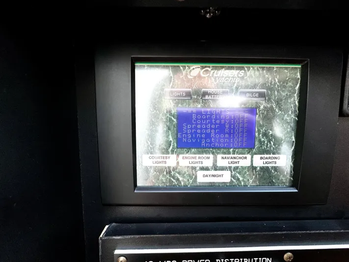  Yacht Photos Pics Control panel of a 2008 Cruisers Yachts 390 Sports Coupe, displaying various light settings.