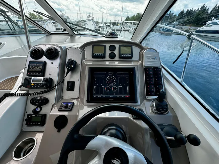  Yacht Photos Pics Cockpit view of 2008 Cruisers Yachts 390 Sports Coupe with navigation instruments.