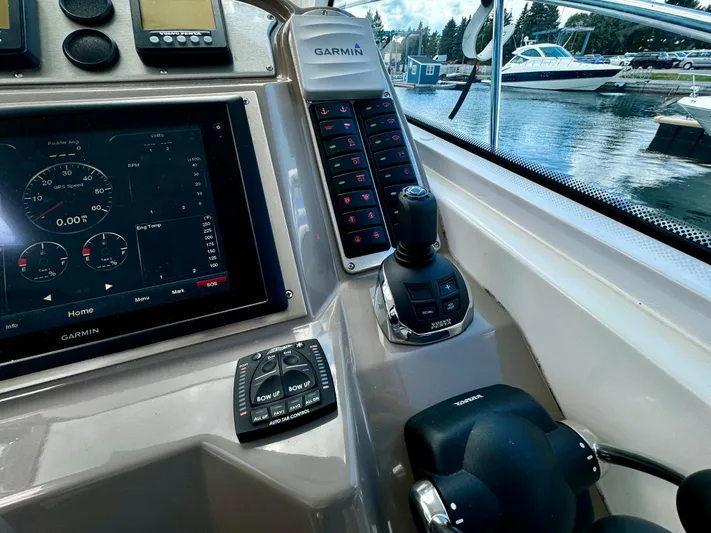  Yacht Photos Pics Control panel of 2008 Cruisers Yachts 390 Sports Coupe with Garmin navigation system.