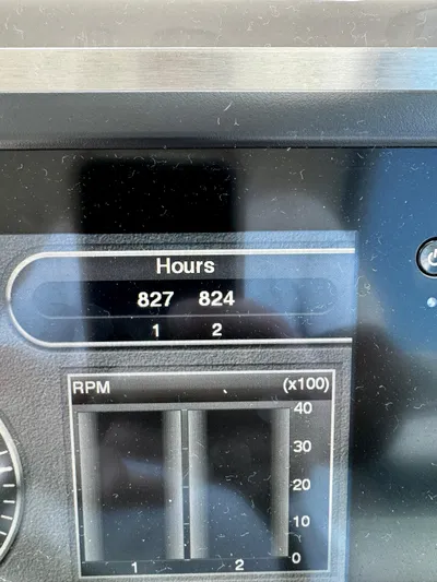  Yacht Photos Pics Display panel of 2008 Cruisers Yachts 390 Sports Coupe showing engine hours and RPM.