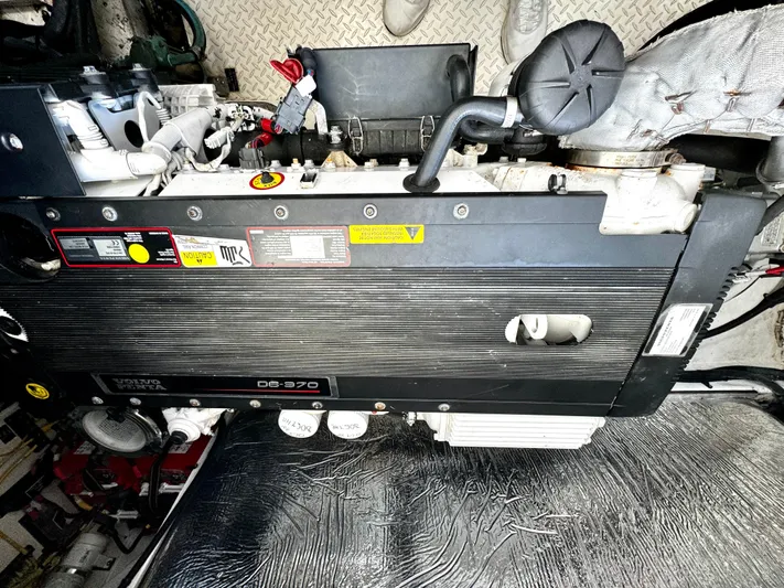  Yacht Photos Pics Engine compartment of a 2008 Cruisers Yachts 390 Sports Coupe, featuring a Volvo Penta D6-370.