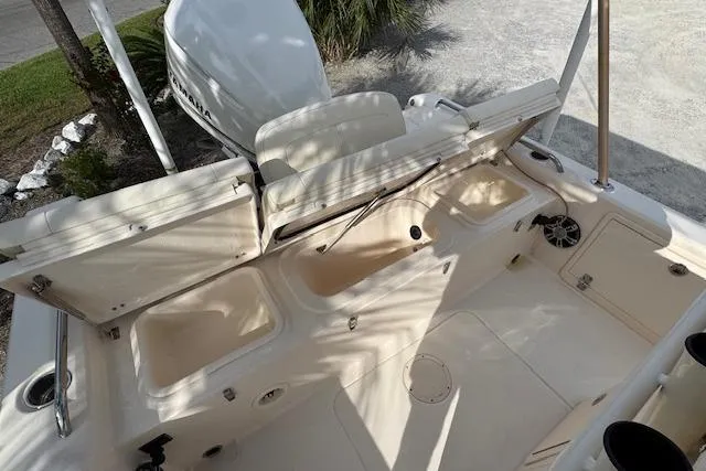  Yacht Photos Pics 2021 Grady-White 251 Coastal Explorer boat interior with open storage compartments.