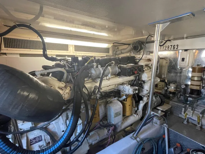 End Game Yacht Photos Pics Engine room of 2001 Ocean Yachts 56 Super Sport, showcasing mechanical components and wiring.