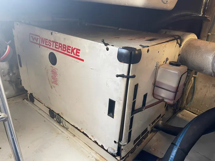 End Game Yacht Photos Pics Westerbeke generator in 2001 Ocean Yachts 56 Super Sport engine room.