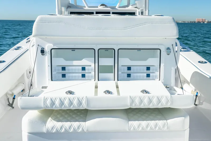  Yacht Photos Pics Manufacturer Provided Image: 2025 Invincible 36 Open Fisherman boat with white seating and storage compartments.