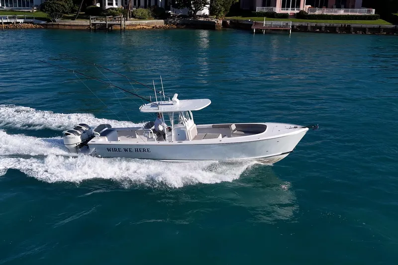  Yacht Photos Pics 2021 Albury Brothers 33 boat cruising on clear blue water.