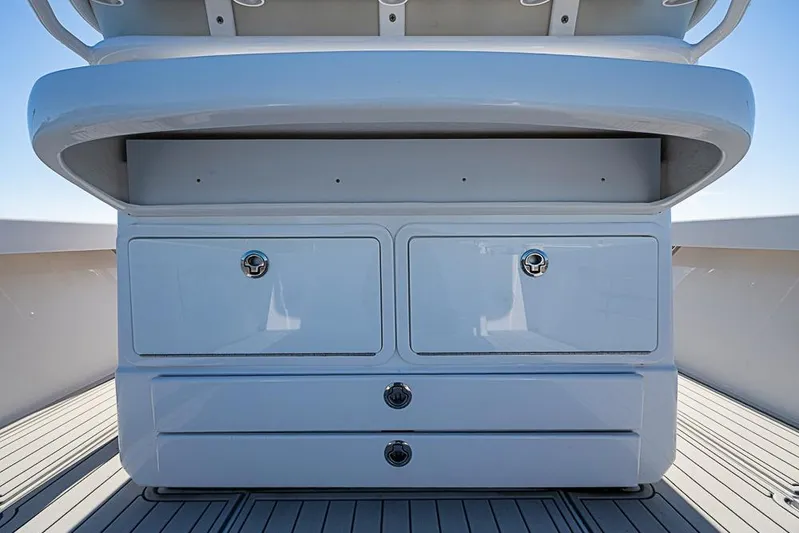 Yacht Photos Pics 2021 Albury Brothers 33 boat storage compartments with sleek white design.