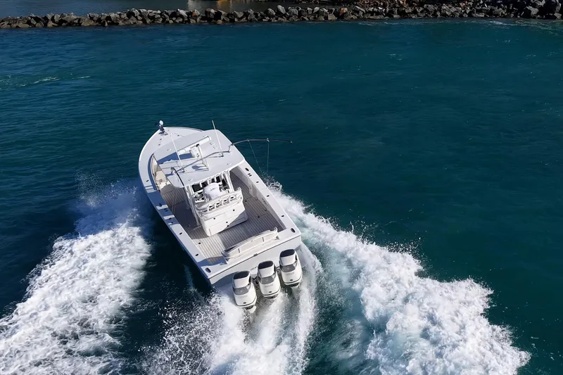  Yacht Photos Pics 2021 Albury Brothers 33 boat cruising on open water with powerful engines.