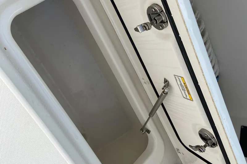  Yacht Photos Pics Open storage compartment on a 2021 Boston Whaler 280 Vantage boat.