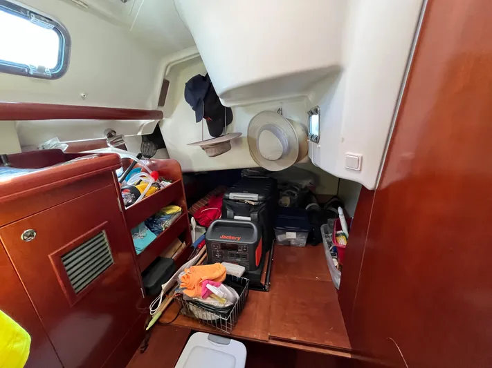 Vita Amoris Yacht Photos Pics Interior of a 2005 Beneteau 423 sailboat with storage and equipment.