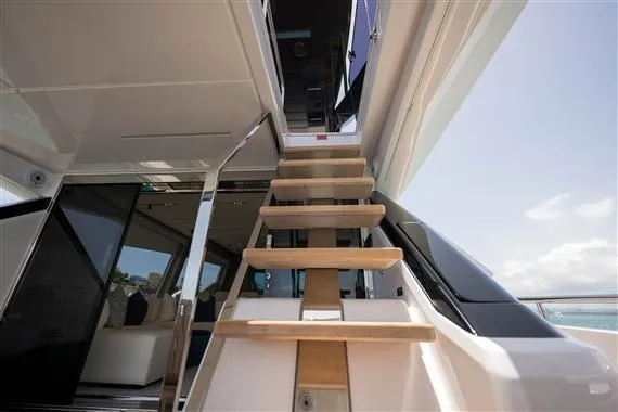  Yacht Photos Pics Staircase on 2023 Ferretti Yachts 720, leading to upper deck with modern design.