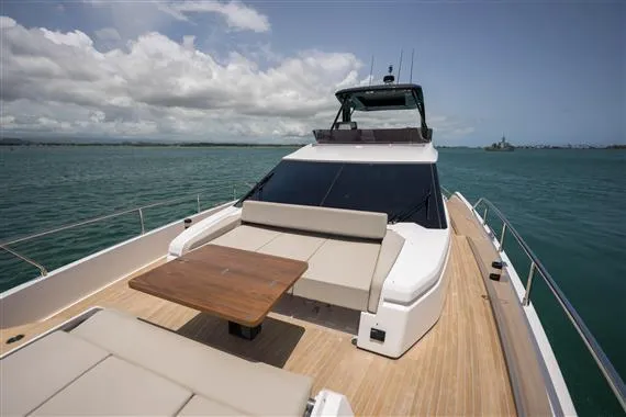  Yacht Photos Pics 2023 Ferretti Yachts 720 on open water, featuring spacious deck and seating area.