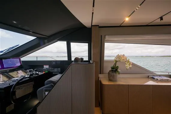  Yacht Photos Pics Interior of 2023 Ferretti Yachts 720, featuring helm and elegant cabin with sea view.