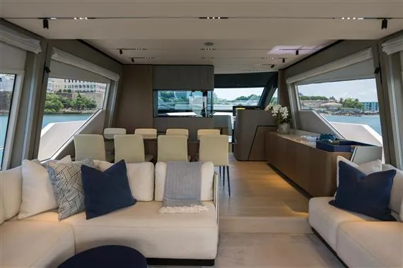  Yacht Photos Pics Luxurious interior of 2023 Ferretti Yachts 720 with elegant seating and dining area.