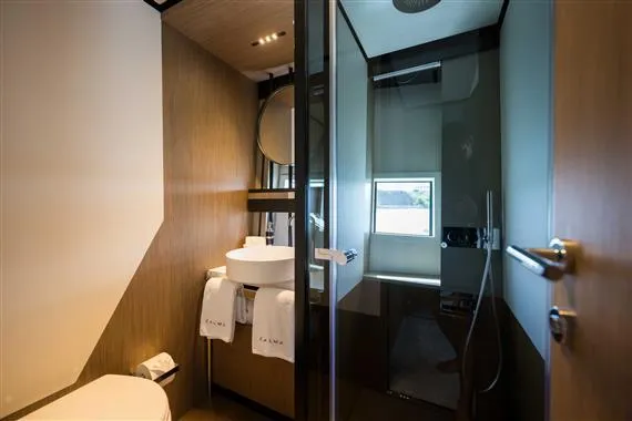  Yacht Photos Pics Luxurious bathroom in 2023 Ferretti Yachts 720, featuring modern fixtures and elegant design.