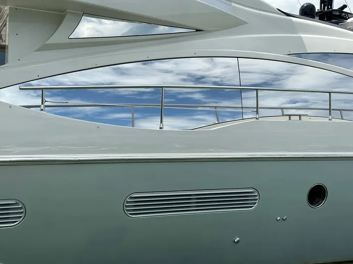 B-enjoy III Yacht Photos Pics Side view of a 2012 Azimut 72S luxury yacht with sleek design.