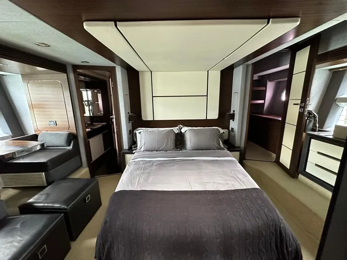 B-enjoy III Yacht Photos Pics Luxurious bedroom interior of 2012 Azimut 72S yacht with modern furnishings.