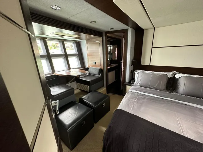 B-enjoy III Yacht Photos Pics Luxurious interior of 2012 Azimut 72S yacht with modern bedroom and seating area.