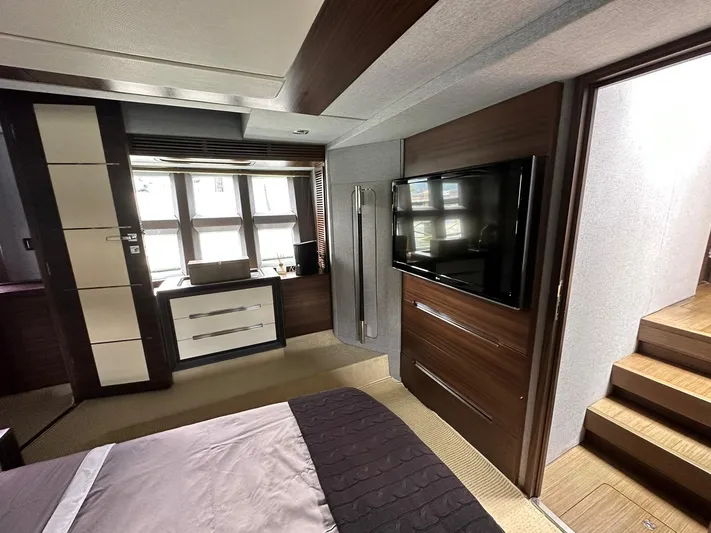 B-enjoy III Yacht Photos Pics Luxurious bedroom interior of 2012 Azimut 72S yacht with modern furnishings.