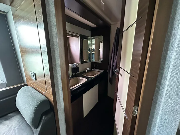 B-enjoy III Yacht Photos Pics Luxurious bathroom interior of 2012 Azimut 72S yacht with dual sinks and modern design.