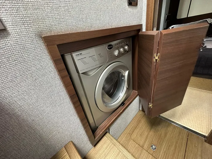 B-enjoy III Yacht Photos Pics Built-in washing machine on 2012 Azimut 72S yacht.