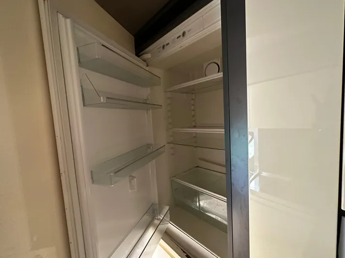 B-enjoy III Yacht Photos Pics Empty refrigerator inside a 2012 Azimut 72S yacht.