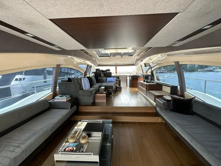 B-enjoy III Yacht Photos Pics Luxurious interior of 2012 Azimut 72S yacht with modern furnishings and panoramic windows.
