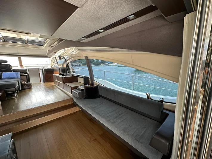 B-enjoy III Yacht Photos Pics Luxurious interior of 2012 Azimut 72S yacht with panoramic windows and modern furnishings.