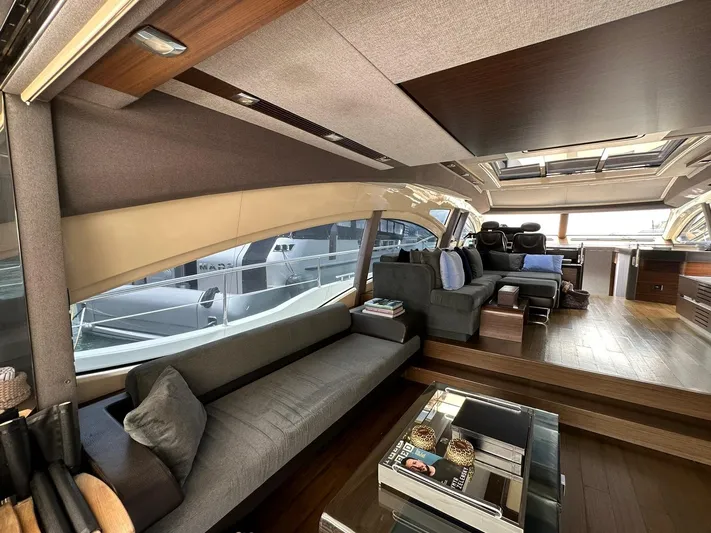 B-enjoy III Yacht Photos Pics Luxurious interior of a 2012 Azimut 72S yacht with modern furnishings and large windows.