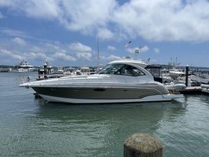 2009 Formula 45 Yacht docked at a marina on a sunny day.