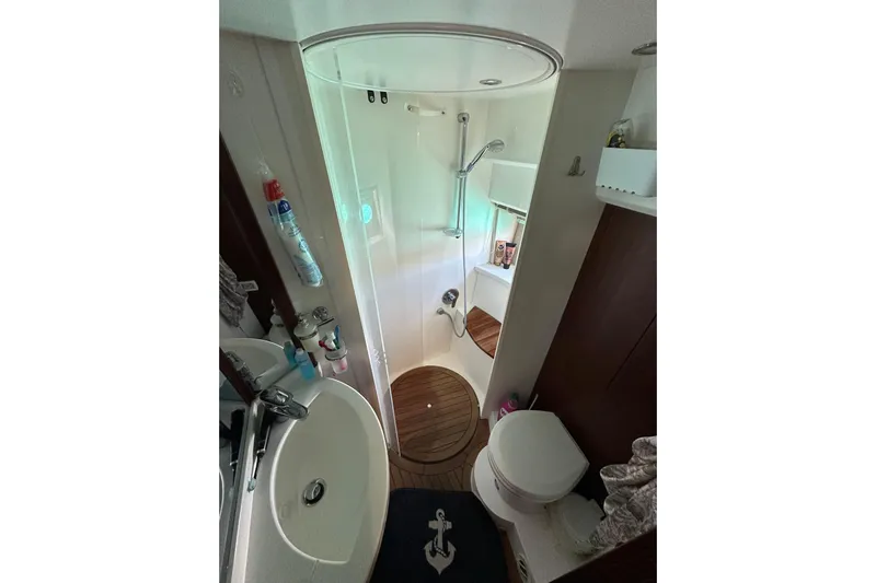  Yacht Photos Pics Luxurious bathroom in 2016 Princess V45 yacht with shower and toilet.